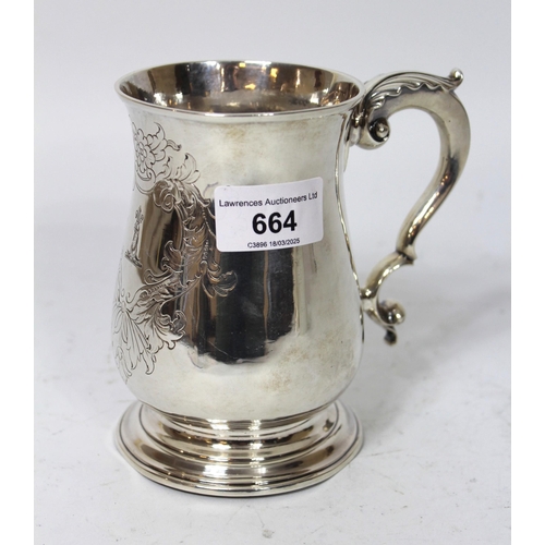 664 - George III silver baluster form mug with scroll handle, London 1776, maker John Robins, 12oz t