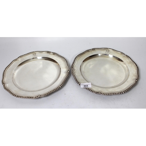 665 - Pair of late George II circular silver plates, London 1758, 33.5oz t, 27cm diameter