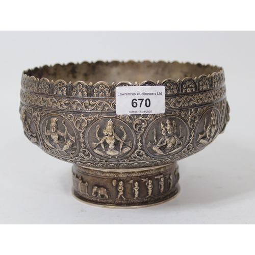 670 - Burmese white metal pedestal bowl cast with various figures, 20oz t