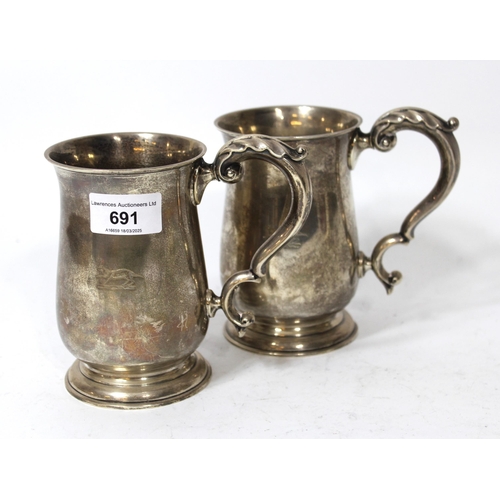 691 - Pair of London silver mugs in antique Georgian style, makers mark for Mappin and Webb, 19oz t