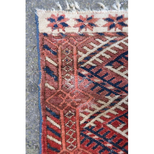 7 - Tekke carpet with five rows of eleven gols on a red ground with borders, 285 x 200cm