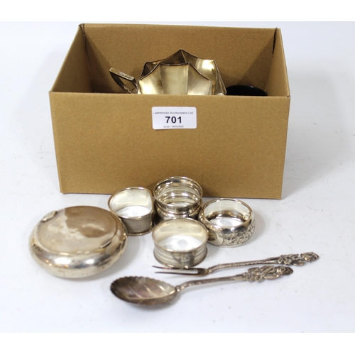 701 - Four silver napkin rings, silver snuff box and a white metal (800 mark) spoon and fork and sundries