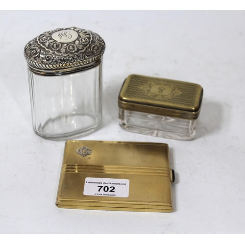 702 - Silver and gilt cigarette case, silver topped cut glass dressing table bottle and another similar wi... 