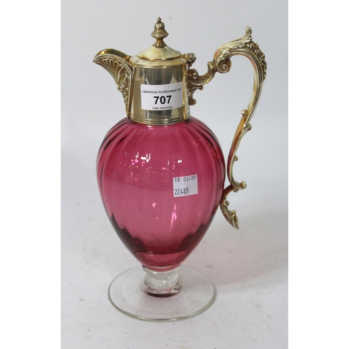 707 - Silver plate mounted cranberry glass pedestal claret jug, 26cm high