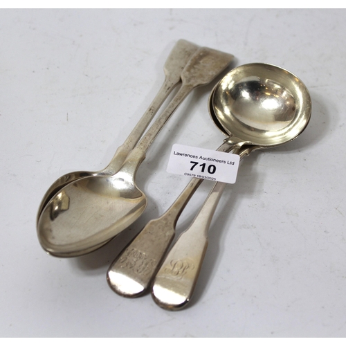 710 - Two George III silver Fiddle pattern ladles and a pair of London silver Fiddle pattern tablespoons