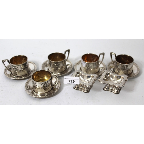 729 - Set of five Continental Art Nouveau silver plated cups and saucers, together with  a pair of similar... 