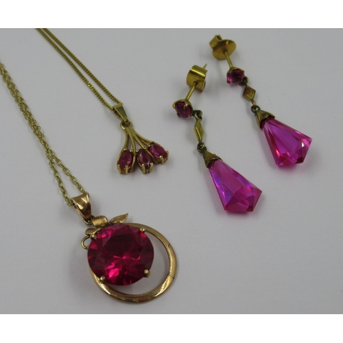 735 - Two 9ct gold and red topaz pendants with chains, together with a pair of similar gilt metal earrings