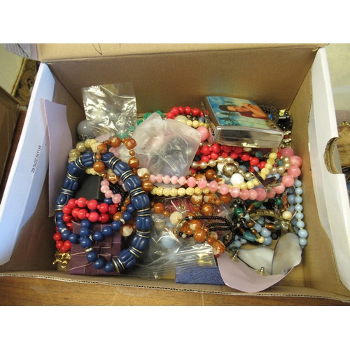 741 - Two boxes containing a large collection of various costume jewellery