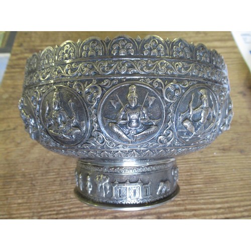 670 - Burmese white metal pedestal bowl cast with various figures, 20oz t