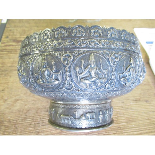 670 - Burmese white metal pedestal bowl cast with various figures, 20oz t