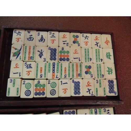 355 - 20th Century Chinese bone and bamboo mahjong set, housed in a wooden case enclosing five drawers, 24... 