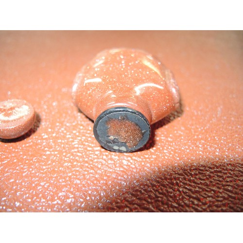 195A - Carved jade figure of a lion, another of a Buddha, a pierced jade disc carved with a figure of a bir... 