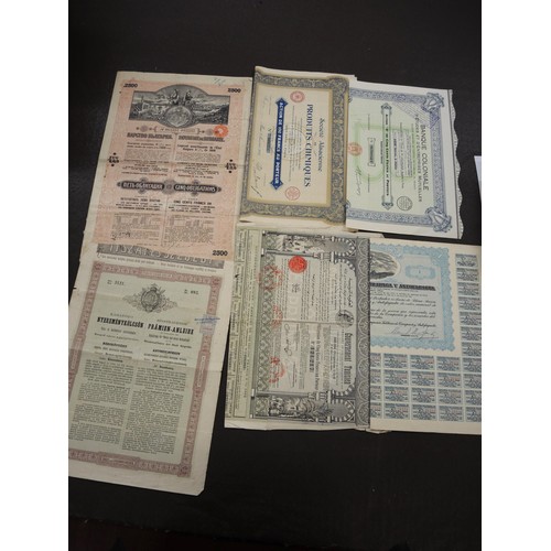 352 - Collection of forty five World share certificates