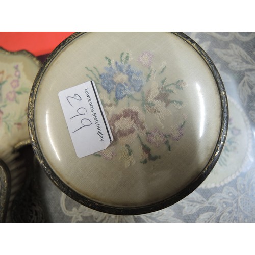 299 - Cased gilt metal dressing table set, together with another similar