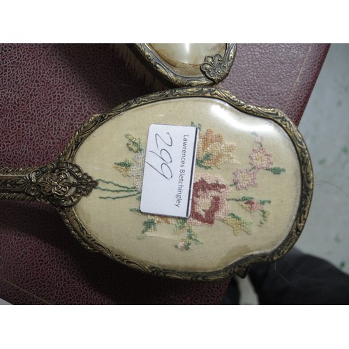 299 - Cased gilt metal dressing table set, together with another similar