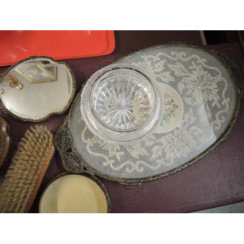 299 - Cased gilt metal dressing table set, together with another similar