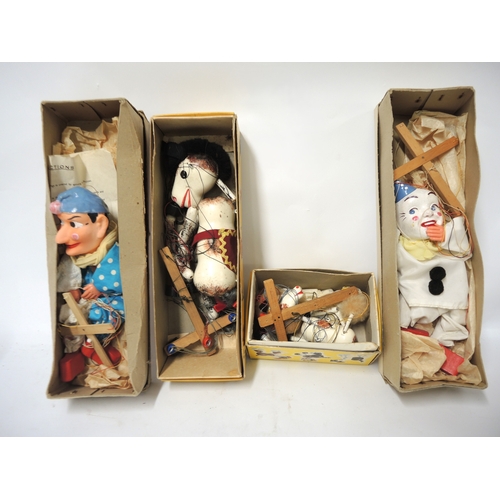 Two Barnsbury puppets in original boxes, together with two Pelham ...