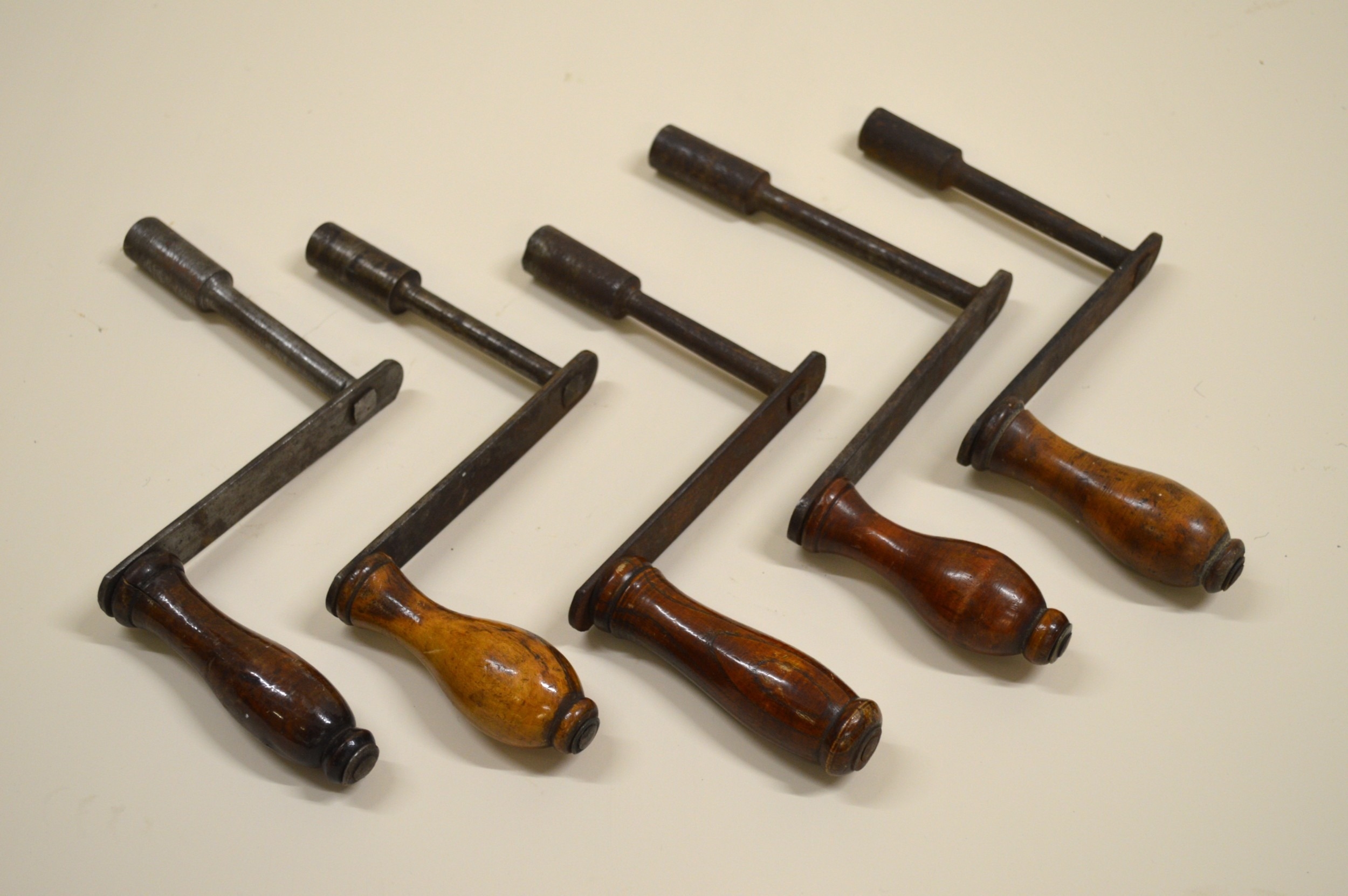 Group of five various 19th Century dining table winders with turned ...