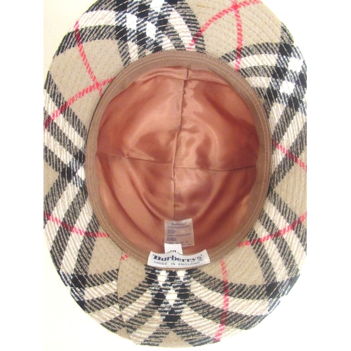 32 - Harrods hat box and another containing a Burberrys hat, size M, two other ladies hats, two fur stole... 