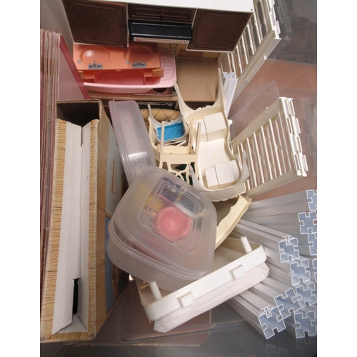 102 - Sindy doll's house together with a quantity of figures, furniture, clothes, accessories etc.