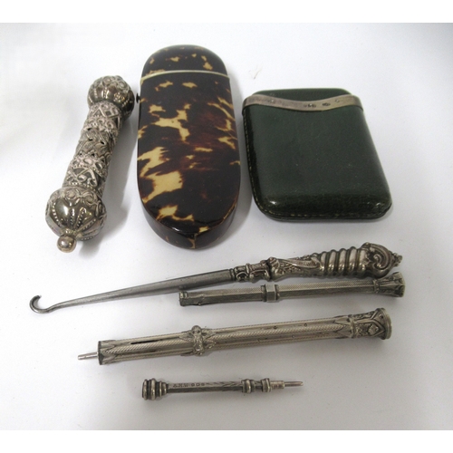 108 - Tortoiseshell spectacle case containing a pair of silver spectacles, small silver mounted leather ca... 