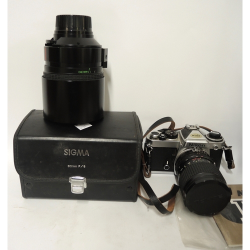 125 - Nikon camera outfit including FM and FE bodies, with various Nikon and other lenses