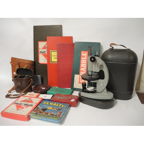 157 - Russian microscope under metal dome with various lenses, pair of leather cased binoculars, another b... 