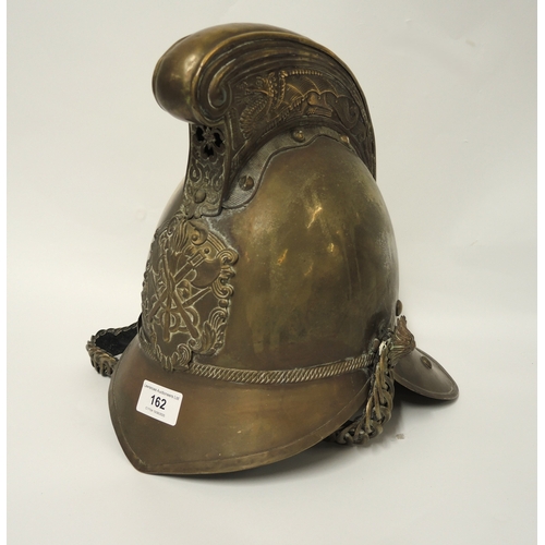 162 - British Merryweather pattern brass fireman's helmet, 27cm high
