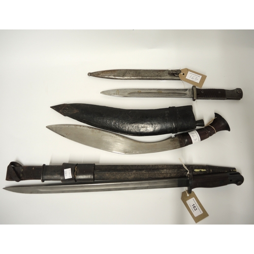163 - Pre World War I Wilkinson bayonet with scabbard, the blade dated 1907, World War II bayonet with ste... 