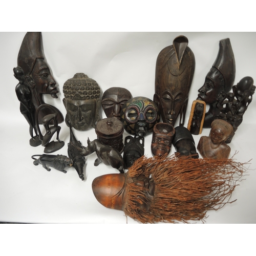 179 - Quantity of African and Far Eastern native carved figures, masks and other items