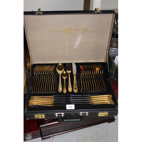 559 - Canteen of modern gold plated cutlery in a briefcase type container