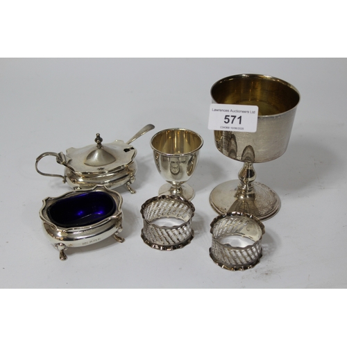 571 - Modern silver goblet, two silver napkin rings, silver egg cup and two silver condiments, 10.5oz t