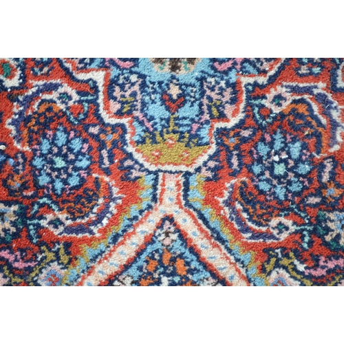 6 - Indo Persian rug with a lobed medallion and all-over Herati design on a brick red ground with corner... 