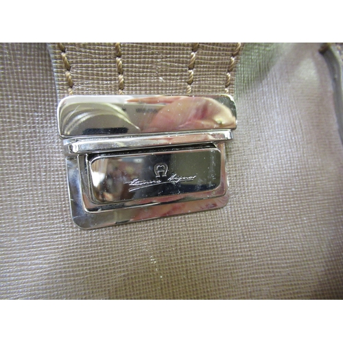 108 - Aigner, weekender bag with detachable shoulder strap, together with a black leather holdall, ' Golf ... 