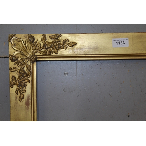 1136 - Early 19th Century giltwood and composition picture frame having corner florette and leaf  decoratio... 