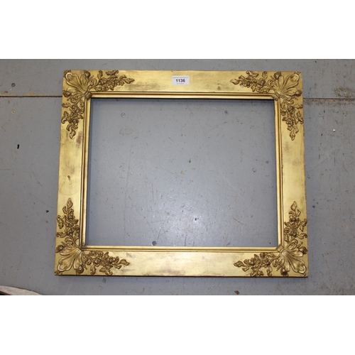 1136 - Early 19th Century giltwood and composition picture frame having corner florette and leaf  decoratio... 