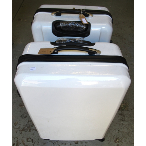 114 - Two unused hard cased spinner suitcases, 78 x 51 x 28cm