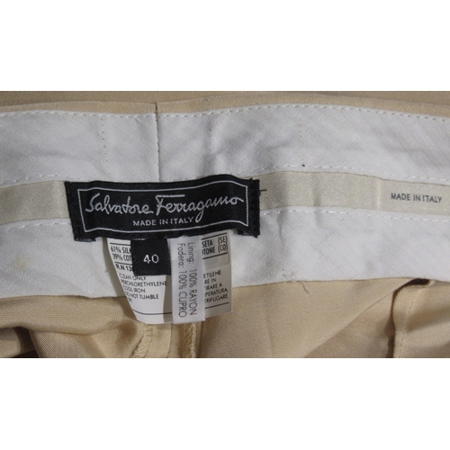 116 - Tod's leather tote bag, together with a pair of Salvatore Ferragamo trousers, size 40