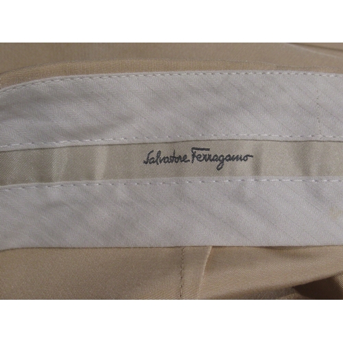 116 - Tod's leather tote bag, together with a pair of Salvatore Ferragamo trousers, size 40