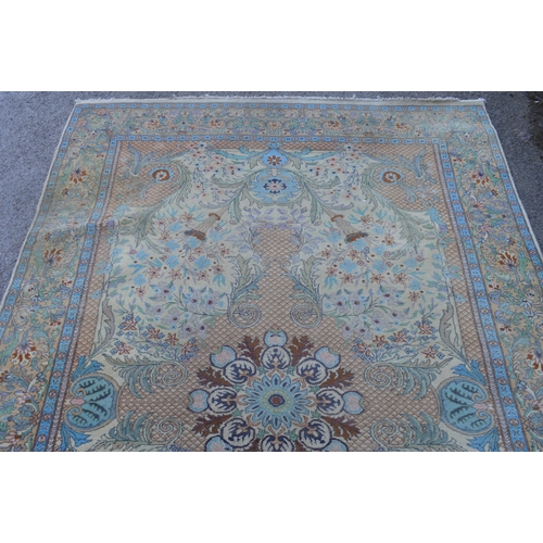 16 - Small Sparta carpet with a medallion and floral design on a beige ground with borders, 270 x 187cm