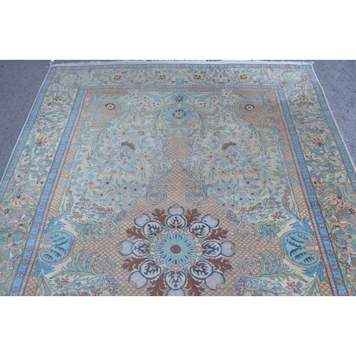 16 - Small Sparta carpet with a medallion and floral design on a beige ground with borders, 270 x 187cm