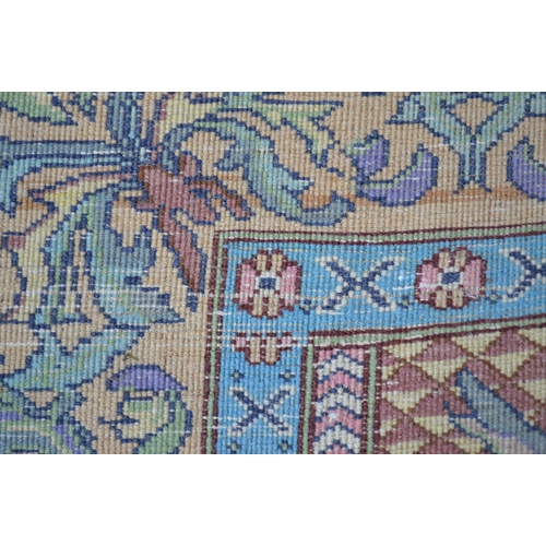 16 - Small Sparta carpet with a medallion and floral design on a beige ground with borders, 270 x 187cm