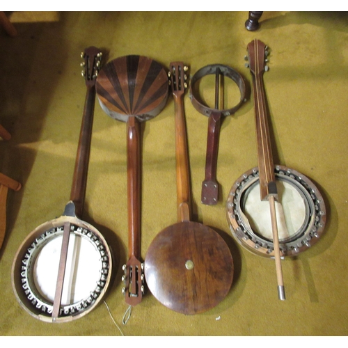 193 - Various banjos and part banjos for restoration, together with a similar banjolele