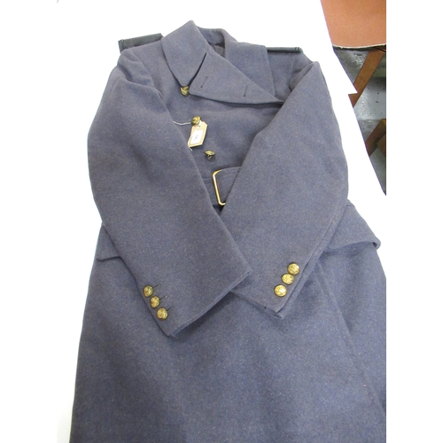 195 - World War II RAF peaked cap, together with a RAF greatcoat dated 1944