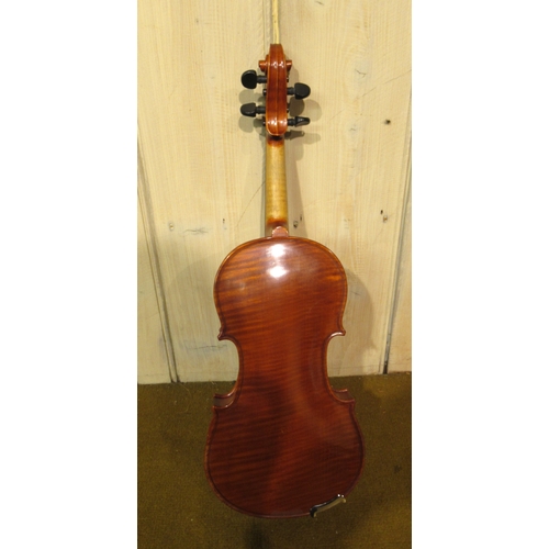 197 - Two Stentor student violins in fitted cases, together with another similar smaller