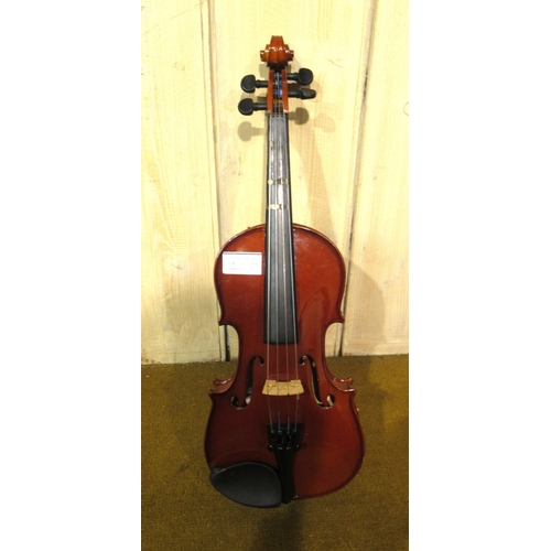 207 - Student quarter size violin in a fitted case, together with a 1/32nd scale violin by Stentor in fitt... 