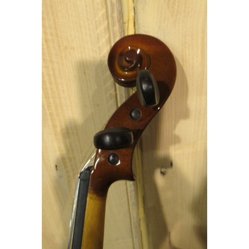 208 - Two quarter size student violins by Stentor, in fitted cases