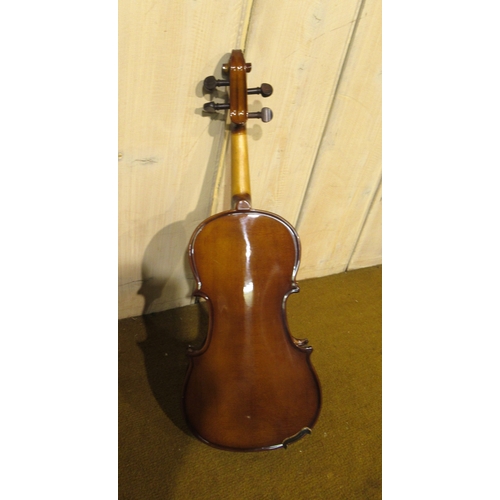 208 - Two quarter size student violins by Stentor, in fitted cases