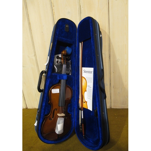 208 - Two quarter size student violins by Stentor, in fitted cases