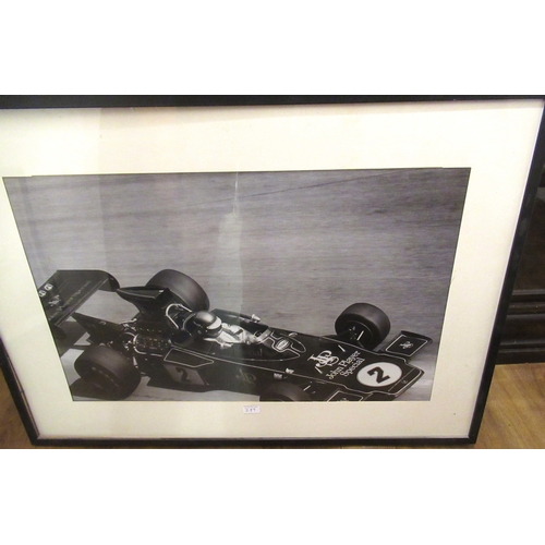 289 - Large framed black and white photograph of James Hunt, another of a racing car and a framed print of... 